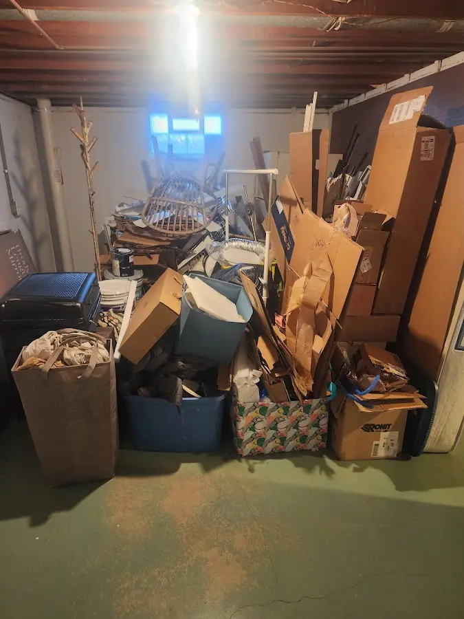 Roll-off dumpster container at job site for 6 Yard Dumpster Rental in Stowe